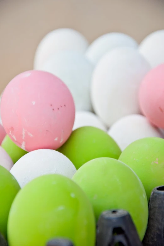 the close up view of some different colored balls