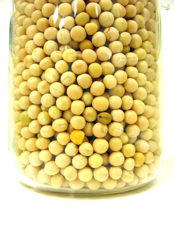 a jar of food that is filled with beans