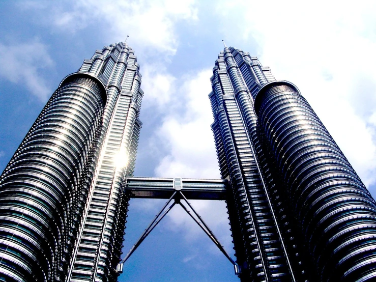 two tall towers standing up in the air