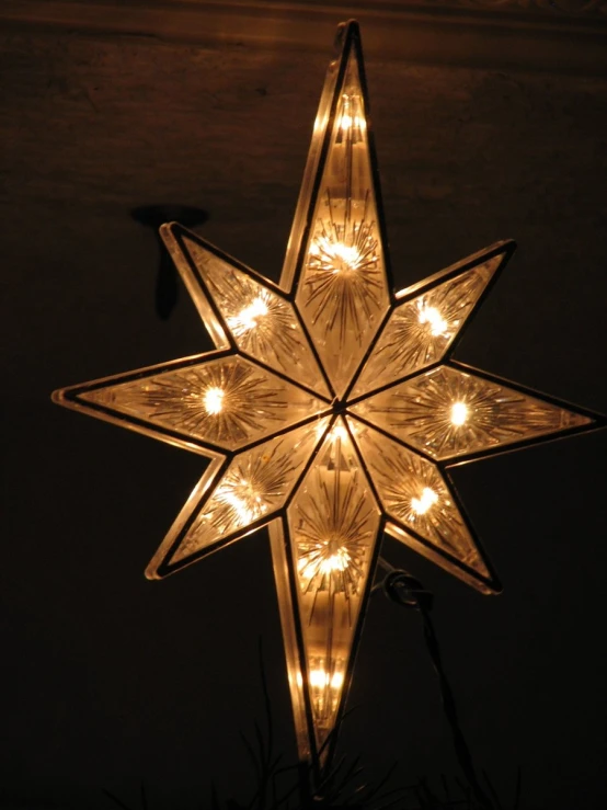 lighted light up snowflake decoration is on the table