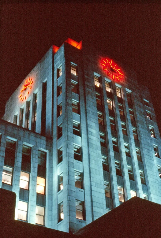 the lights on this building are orange and red