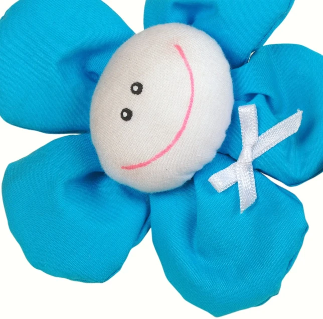 a blue flower with a white cross on it