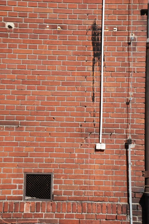 a fire hydrant on the side of a building