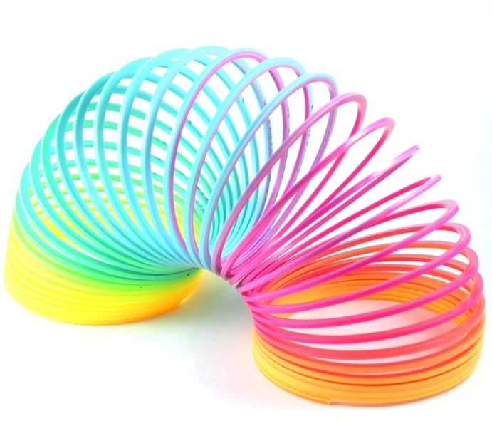 colorful neon and blue rubber bands are arranged next to each other