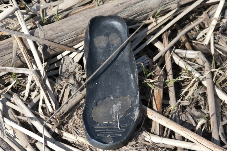 an old, worn out, worn down pair of shoes