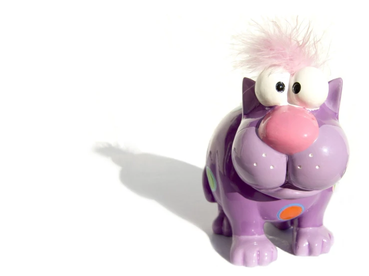 a plastic purple animal toy with a pink balloon