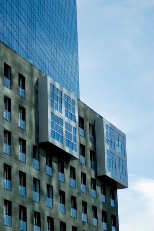 this building has multiple windows and balconies