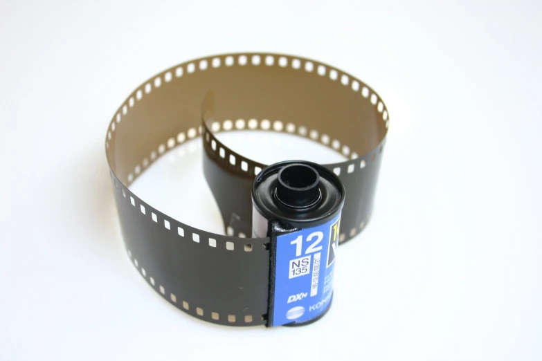 a film strip with a film camera attached to it