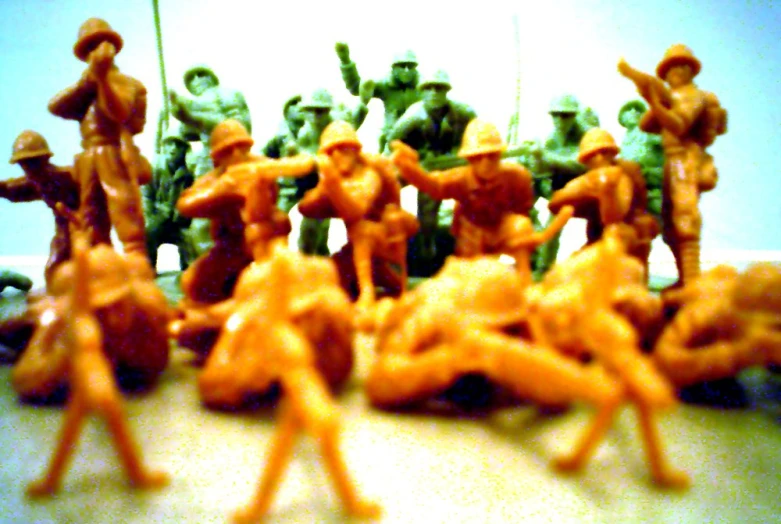 a large group of toy soldiers on the floor