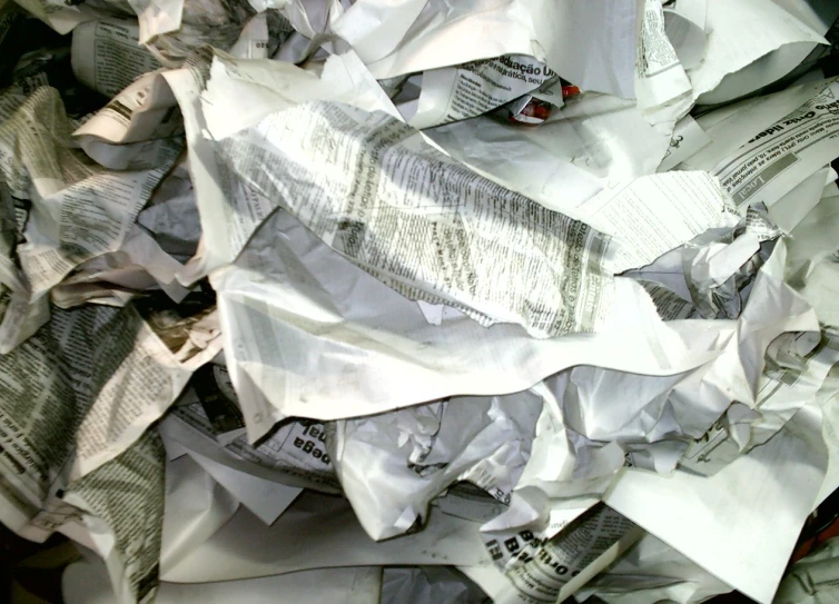 a pile of papers that are laying down