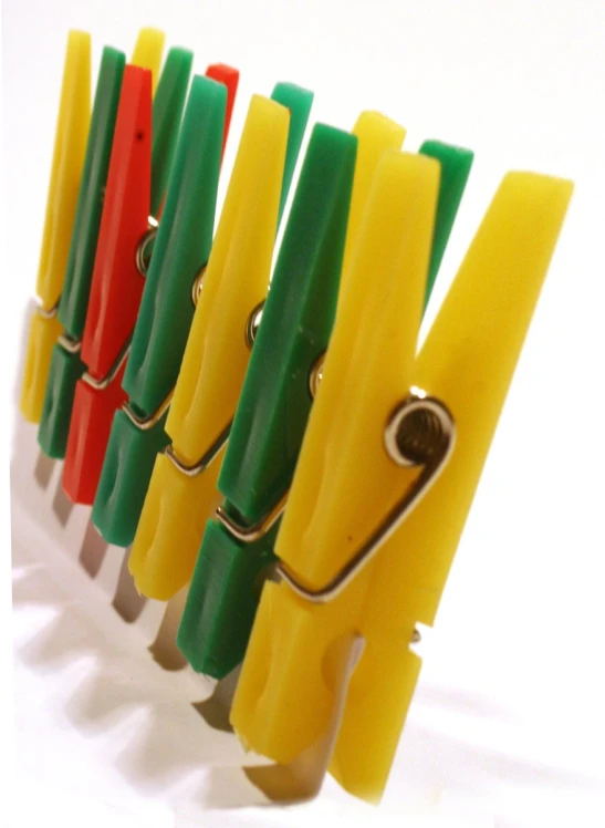 a row of different colored toothbrush holders in rows