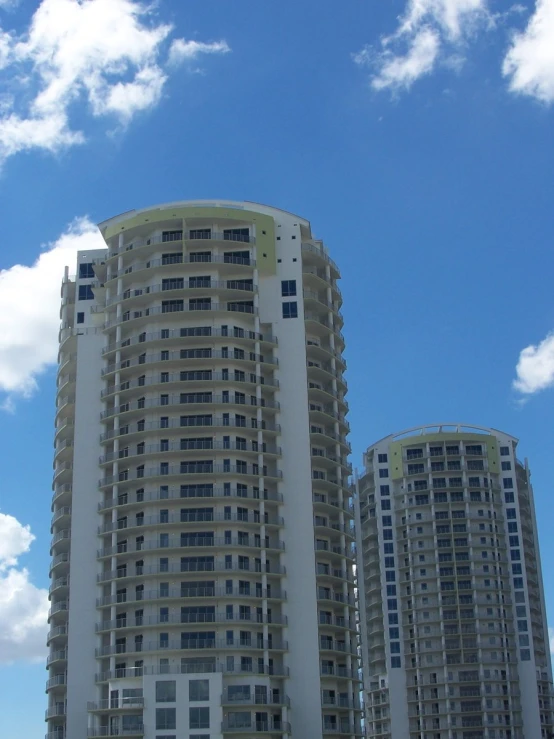 two buildings are shown, with sky in background