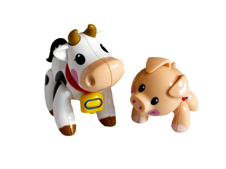 two toy animals, one cow and one bull