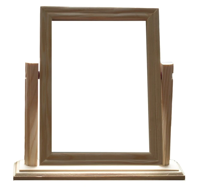an unfinished wooden frame sitting on top of a table
