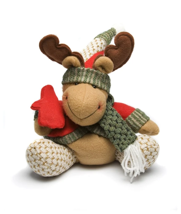 a stuffed reindeer with a hat and scarf