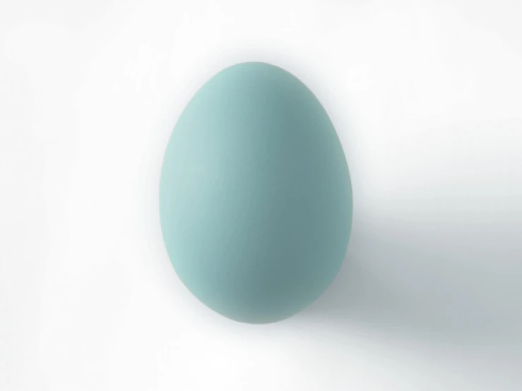 a blue egg in the shape of a face