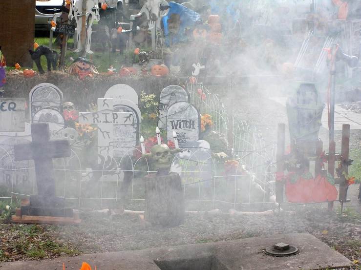 smoke rising out of a grave and looking over a head stone