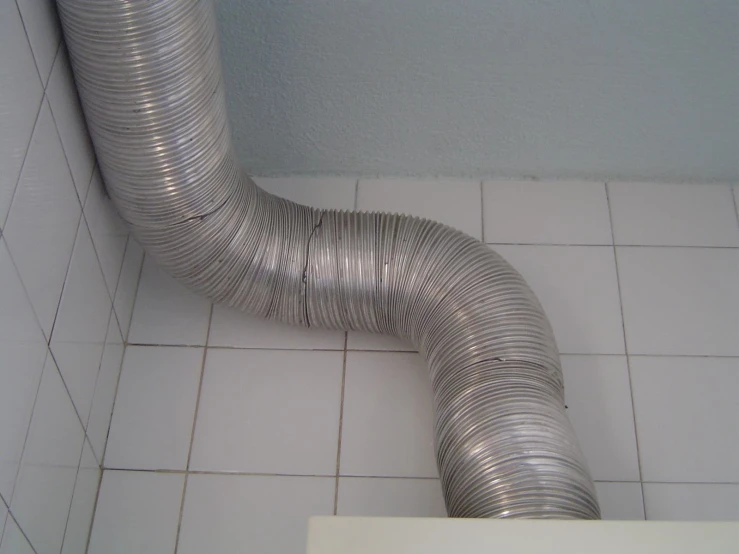 an overhead view of the top of a metal pipe