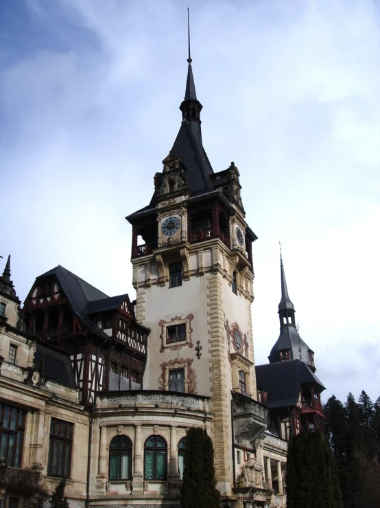 a large building with clocks on the top