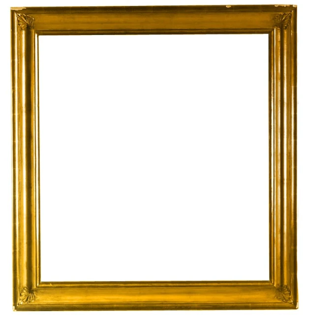 an old gold frame hanging on the wall