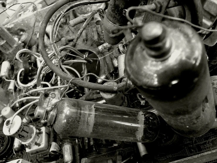 old engine and wiring from a car with water pump