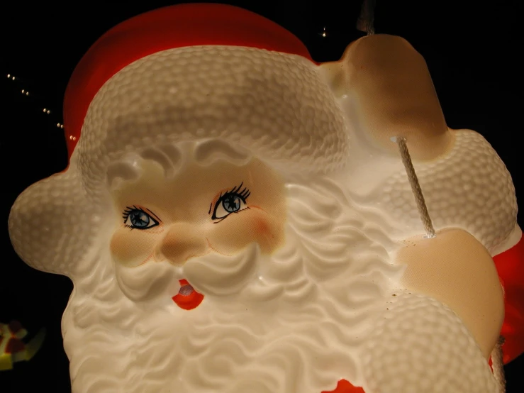 the lighted santa face features a toothpick to pick up