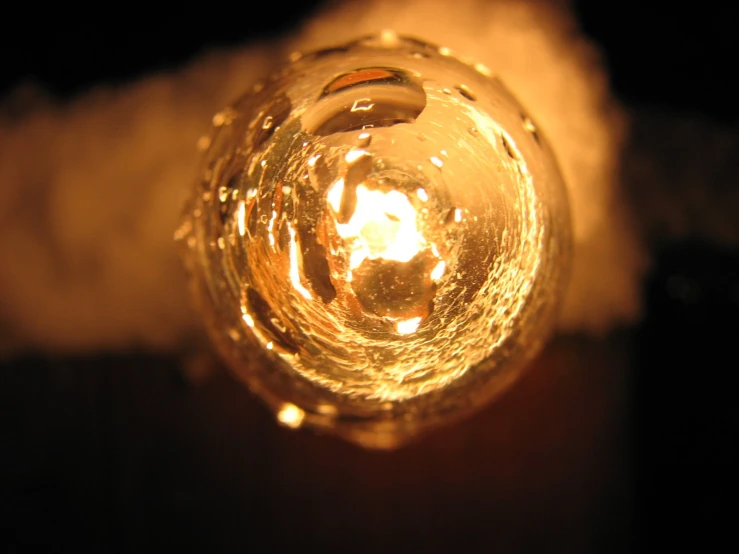 the inside of a glass with a light inside