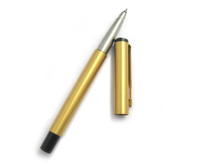 the small ballpoint pen is golden with a black tip