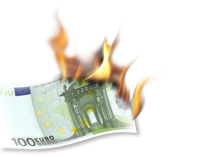 a 50 euro bill on fire on a white background