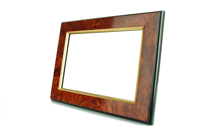 a wooden frame with an empty white board