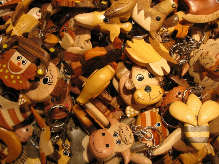 some wooden toys are on display next to each other