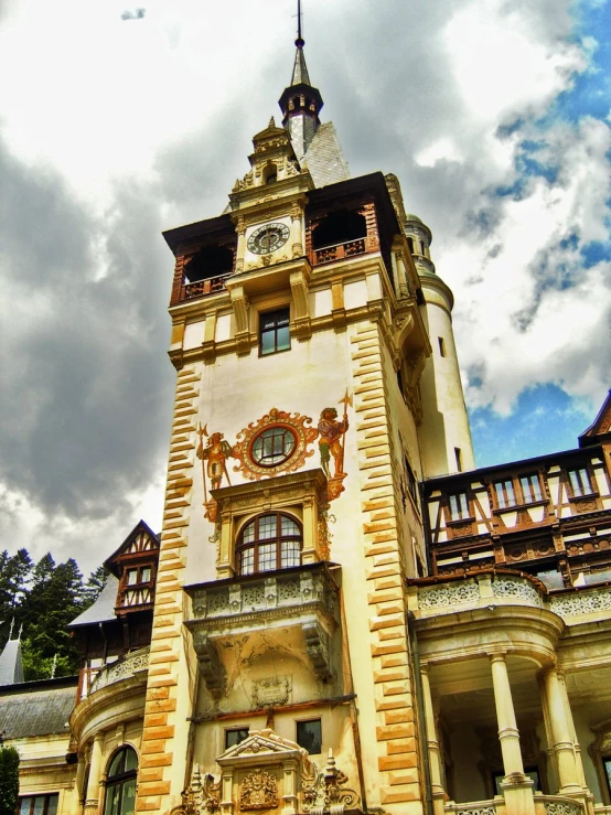 a tall tower structure with clocks on the sides