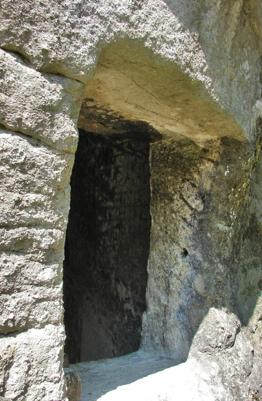 there is a small cave entrance in the rock