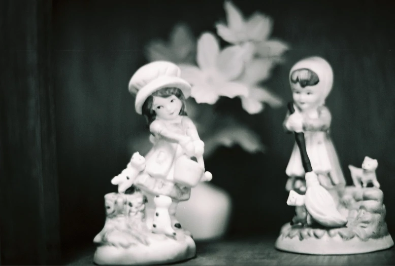 a close up of two figurines near one another