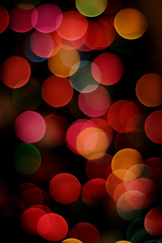 a large lot of bokeh lights on the night sky