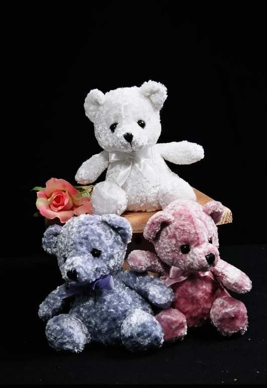 a group of small stuffed animals on top of a table