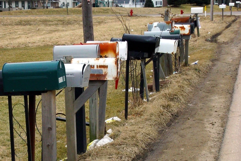 the row of mailboxes are next to each other