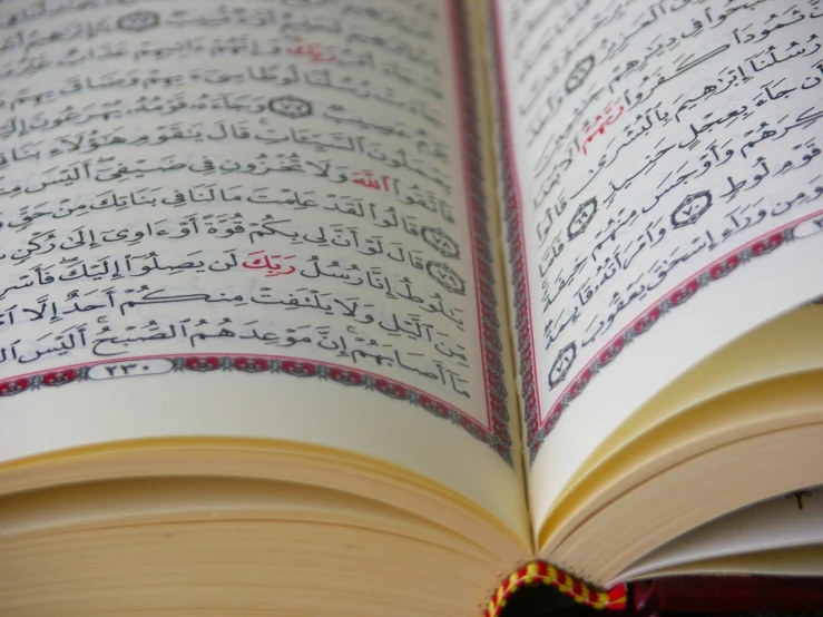 the open book is showing the arabic script