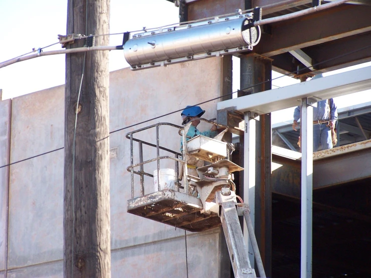 a man climbing up the side of a building