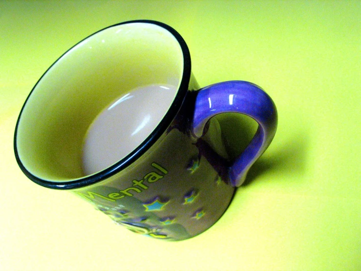 a small cup sitting on top of a table