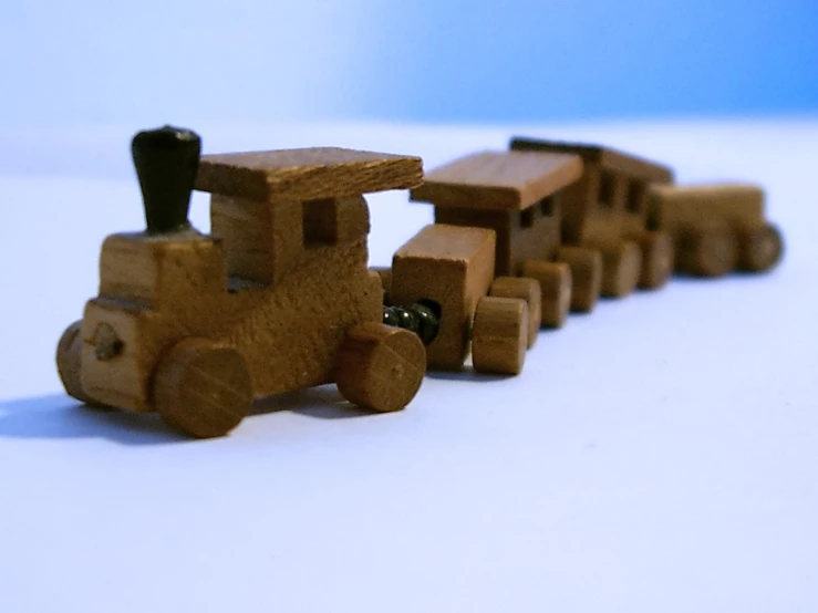 a toy truck being made out of wooden blocks