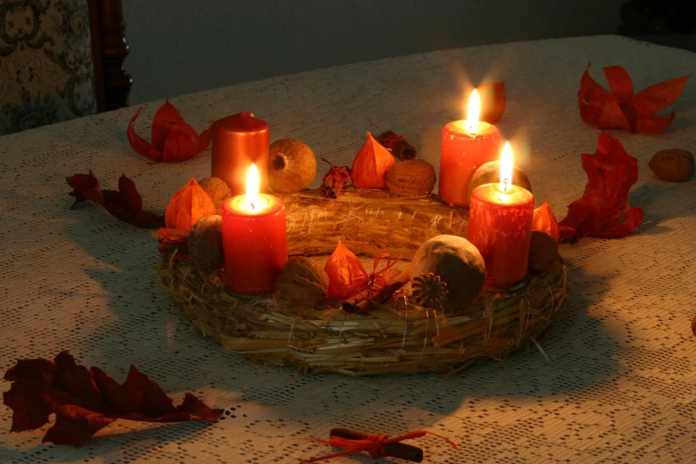 a cake is sitting on a table with many candles in it