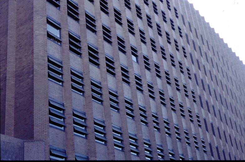 the facade of a building with windows on either side