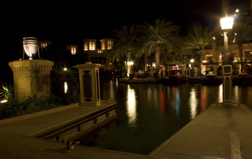 an image of a lake and city in the night