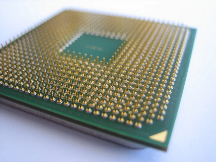 an electronic chip that looks like it has many tiny holes