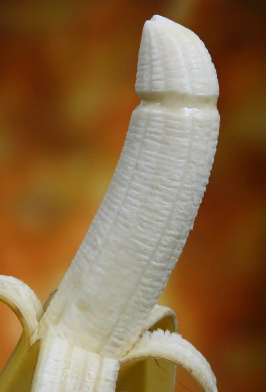 a large sliced banana sitting on top of a table