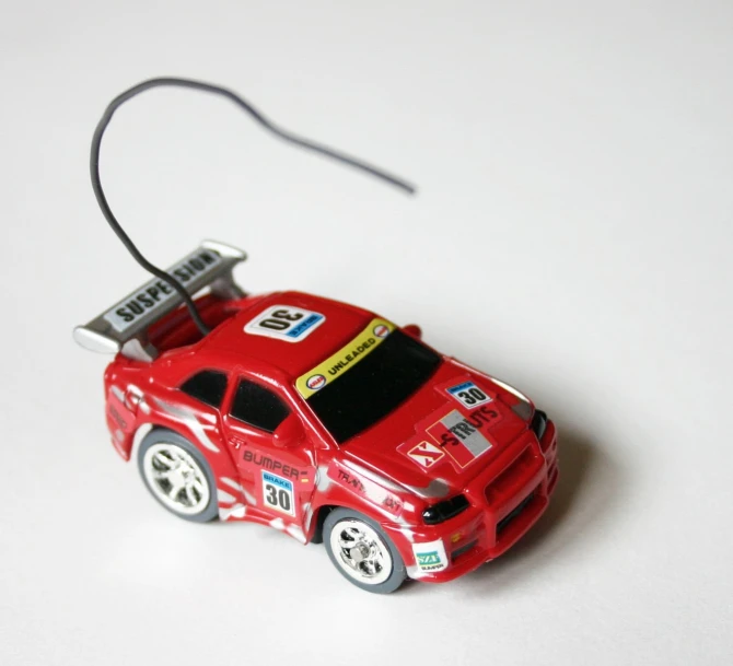 an image of a toy car toy in the air