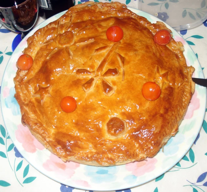 the pie has been decorated with orange slices