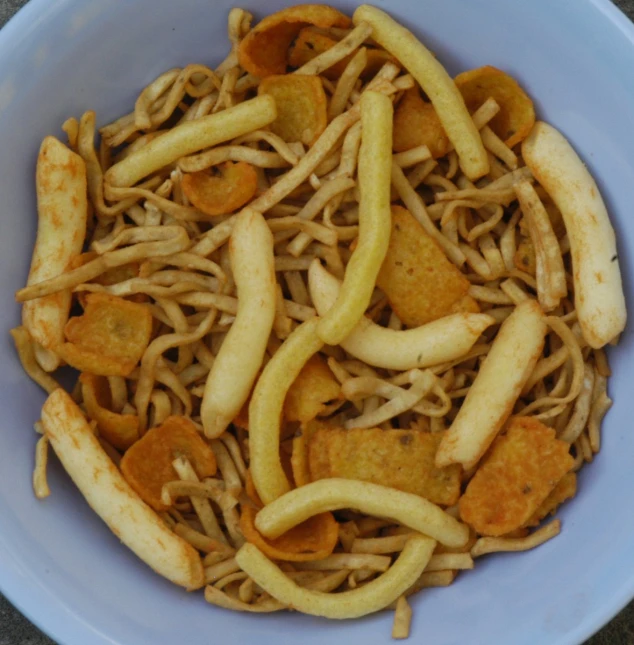 a bowl of chinese noodles with meat