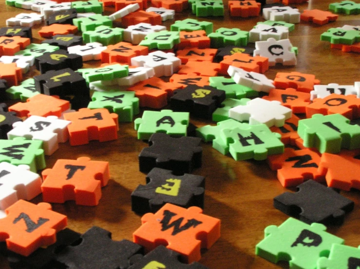 a wooden table with some toy letters on it